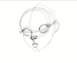 the beginning sketch of a woman's face, with extra shape lines still surrounding it